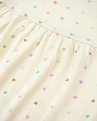 H&M OFF WHITE OVERALL HEARTS PRINTED DRESS