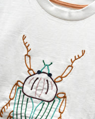 MACYS OFF WHITE EMBROIDRED T-SHIRT