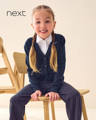 NEXT NAVY BLUE COTTON RICH BOW POCKET SCHOOL CARDIGAN -4A