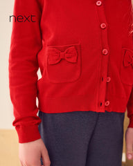 NEXT RED COTTON RICH BOW POCKET SCHOOL CARDIGAN -5A