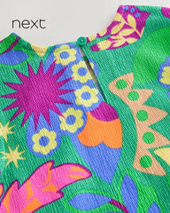 NEXT TROPICAL PRINT PEPLUM TEXTURED BLOUSE