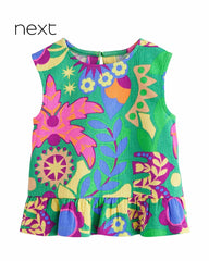 NEXT TROPICAL PRINT PEPLUM TEXTURED BLOUSE