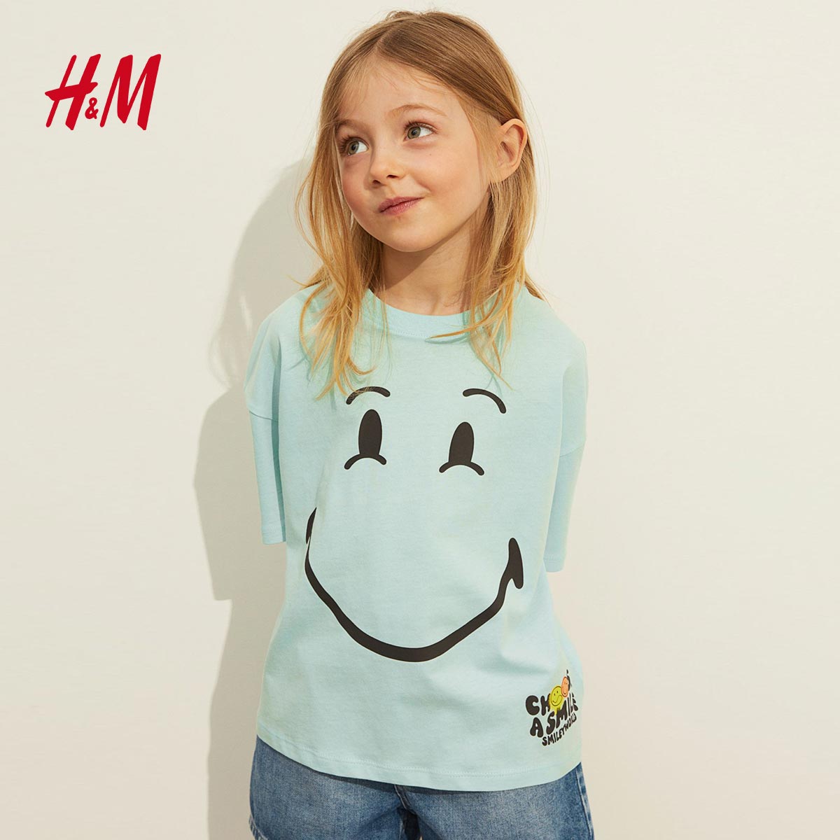 H&M TURQUOISE SMILEY WORLD T-SHIRT – PEEKABOO.PK