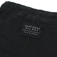 MACYS BLACK PIQUE SHORT WITH SLOGAN
