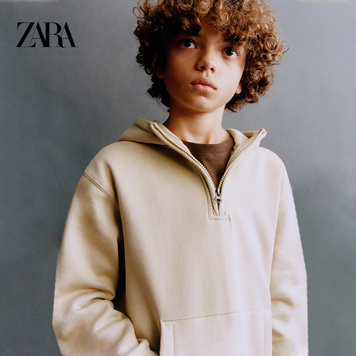 https://www.peekaboo.pk/wp-content/uploads/2022/12/ZARA-LIGHT-BEIGE-HOODED-SWEATSHIRT-WITH-ZIP-1.jpg